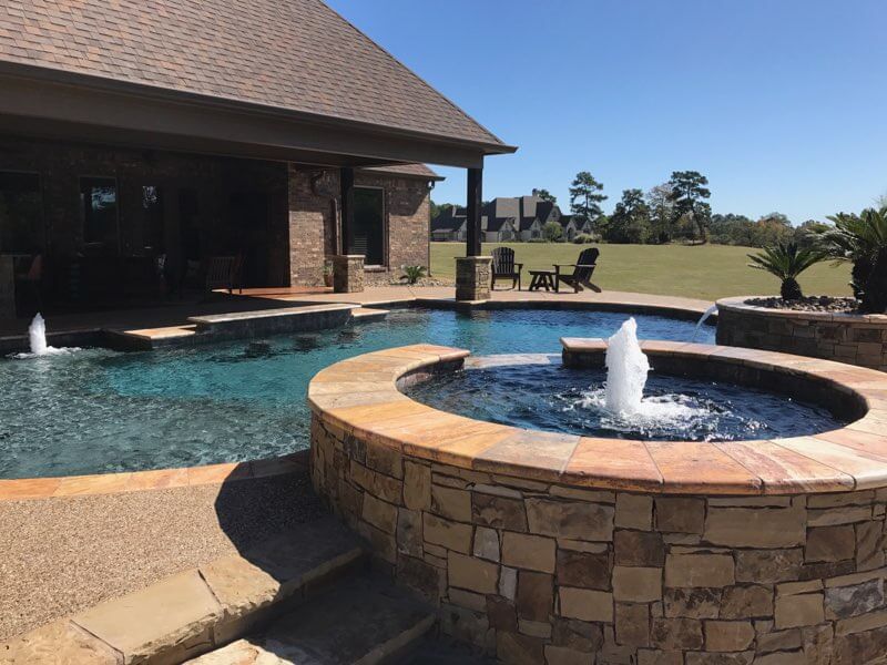 Freeform Pool with Raised Spa, Bubblers and Swim-up Bar