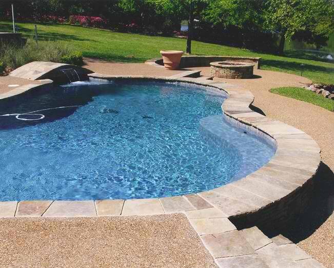 Drop Ledge Swimming Pool with Sheer Descent and Firepit